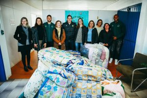 Atletas da Chape fazem doação para a Casa de Passagem